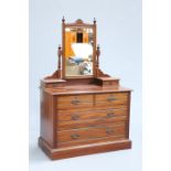 A LATE VICTORIAN MAHOGANY DRESSING CHEST, with two short over two long drawers.