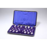 AN EDWARD VII CASED SET OF TWELVE SILVER COFFEE SPOONS AND SUGAR TONGS, by Lee & Wigfull (Henry