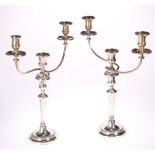 A PAIR OF MATTHEW BOULTON OLD SHEFFIELD PLATE THREE LIGHT CANDELABRA, CIRCA 1830, the tapering stems