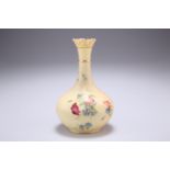 A ROYAL WORCESTER BLUSH IVORY VASE, bottle-shaped, painted with flowers, shape no. G702, date code
