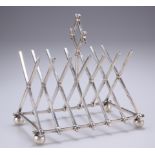 AN UNUSUAL VICTORIAN SILVER TOAST RACK, by Hunt and Roskell, London 1867, six section toast rack