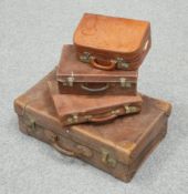 ~ FOUR PIECES OF VINTAGE LUGGAGE, including a large leather case with 'NORTH' printed to the lid;