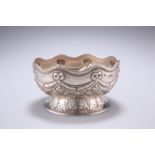 A VICTORIAN SILVER BOWL, by Richard Martin and Ebenezer Hall, London 1883, the lobed bowl embossed