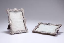 A PAIR OF EDWARDIAN SILVER-FRONTED PHOTO FRAMES, maker probably Joseph Gloster, Birmingham 1900,