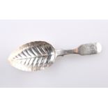 A GEORGE III SILVER CADDY SPOON, makers mark rubbed, London 1815, with leaf shaped bowl, handle