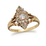 A DIAMOND RING, the marquise shaped mount set with graduated stones between split scrolling