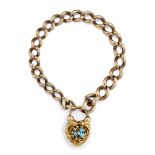 A GOLD BRACELET WITH TURQUOISE HEART CLASP,