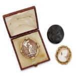 TWO CAMEO BROOCHES AND A JET CAMEO,