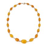 AN AMBER BEAD NECKLACE,