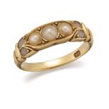 AN 18 CARAT GOLD AND PEARL RING, stamped '18', set with three slightly graduated pearls