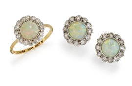AN 18CT AND PLATINUM OPAL AND DIAMOND CLUSTER RING AND A PAIR OF MATCHED EARRINGS,