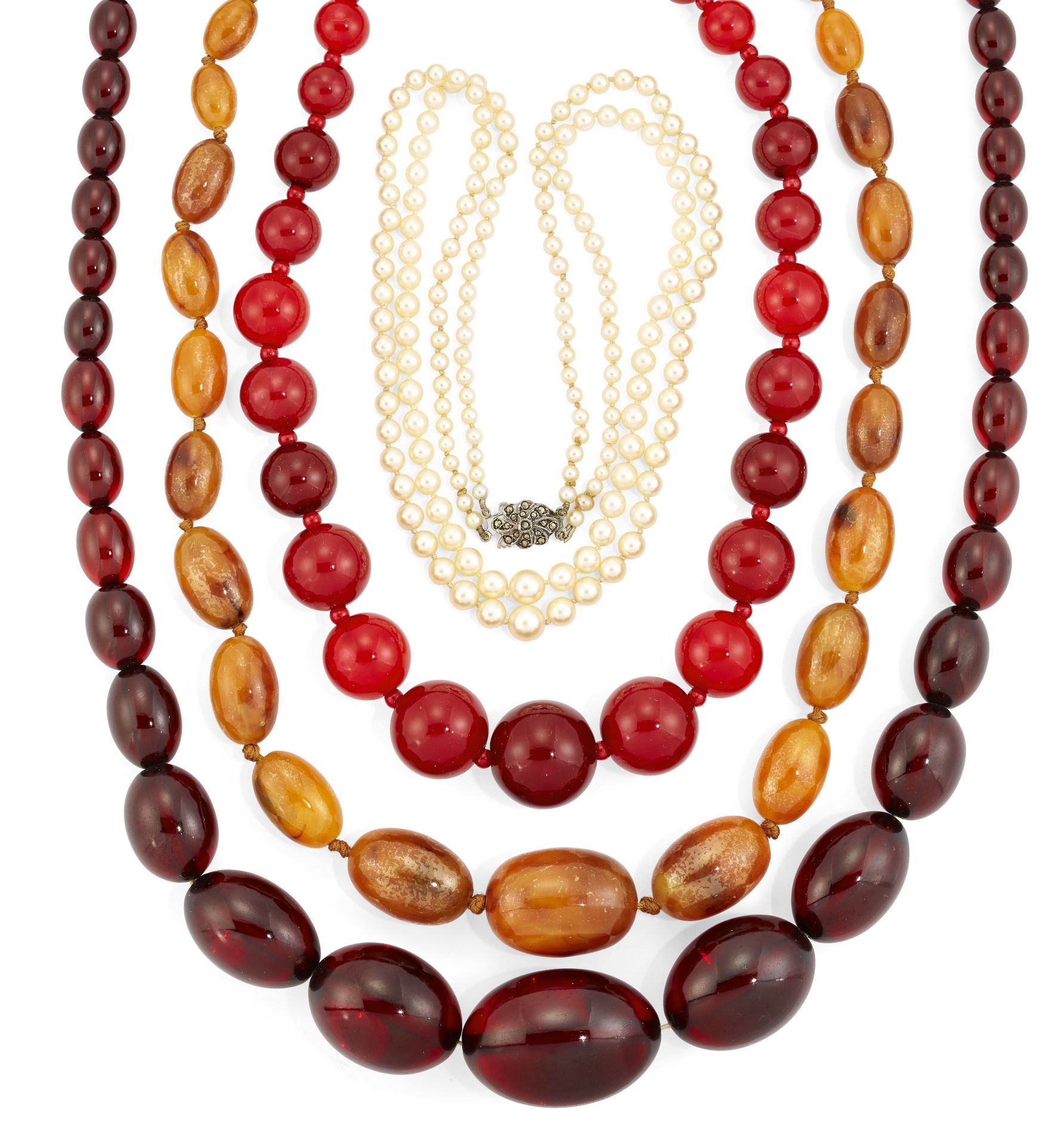 THREE FAUX AMBER NECKLACES AND A CULTURED PEARL NECKLACE,