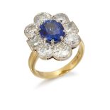 AN 18CT SAPPHIRE AND DIAMOND CLUSTER RING,