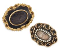 TWO VICTORIAN HAIRWORK AND ENAMEL MOURNING BROOCHES,