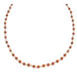 A 9 CARAT GOLD, CORAL AND PEARL CHAIN, with bolt/ring clasp stamped 9ct. 45cm long overall