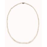 A CERTIFIED NATURAL SALTWATER PEARL NECKLACE WITH DIAMOND CLASP,