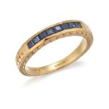 A 9CT HALF HOOP SAPPHIRE RING,