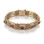 A 9CT AMETHYST GATE BRACELET,