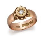 A 9 CARAT GOLD AND DIAMOND RING, hallmarked Birmingham 1915, set with a single diamond within a