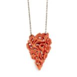 A CARVED CORAL NECKLACE,