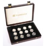 TWELVE SILVER ONE POUND COINS, (ten with COA), boxed