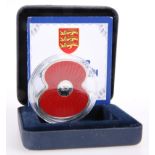 A 2012 £5 SILVER POPPY COIN, boxed with certificate.