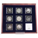 A SYMBOLS OF CANADA SILVER DOLLAR EIGHT COIN SET, boxed with COA