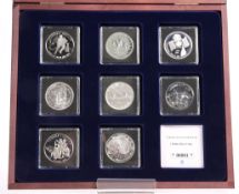 A SYMBOLS OF CANADA SILVER DOLLAR EIGHT COIN SET, boxed with COA
