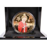 A CHRISTMAS FIVE CROWNS COIN, boxed.