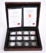 A QUEEN ELIZABETH II LIFETIME OF SERVICE SILVER PROOF TWELVE COIN COLLECTION, boxed with COAs
