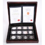 A QUEEN ELIZABETH II LIFETIME OF SERVICE SILVER PROOF TWELVE COIN COLLECTION, boxed with COAs