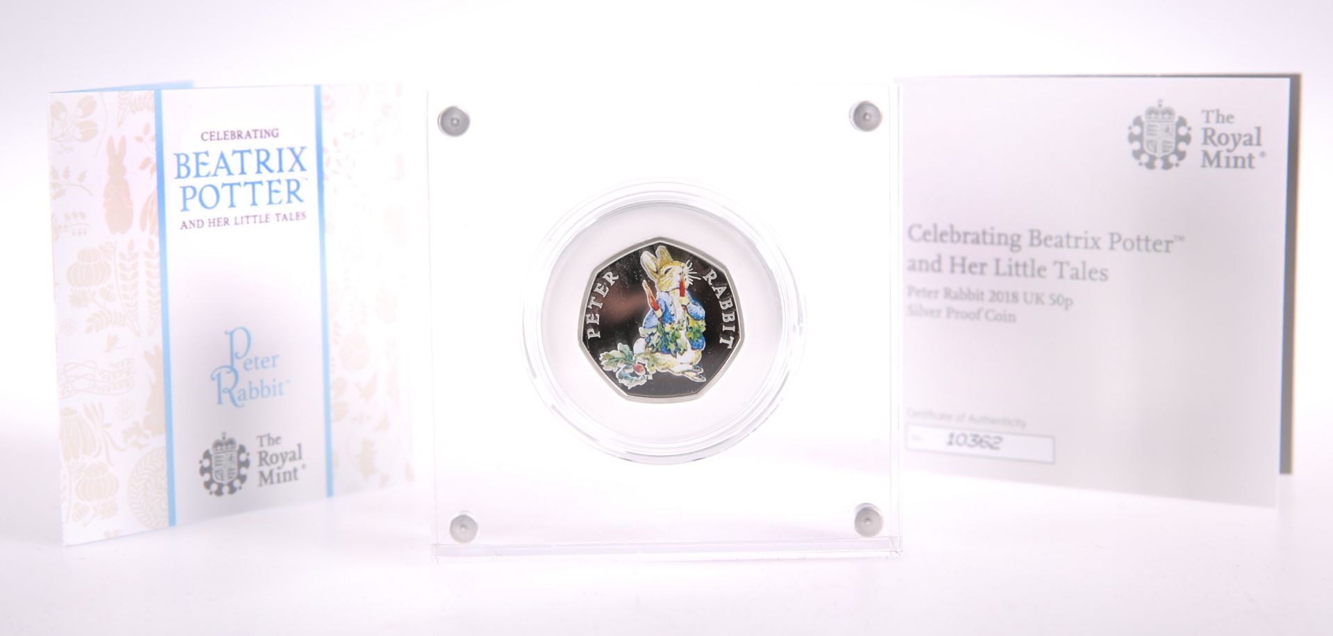 A ROYAL MINT PETER RABBIT 2018 50P SILVER PROOF COIN, boxed with COA no. 10362