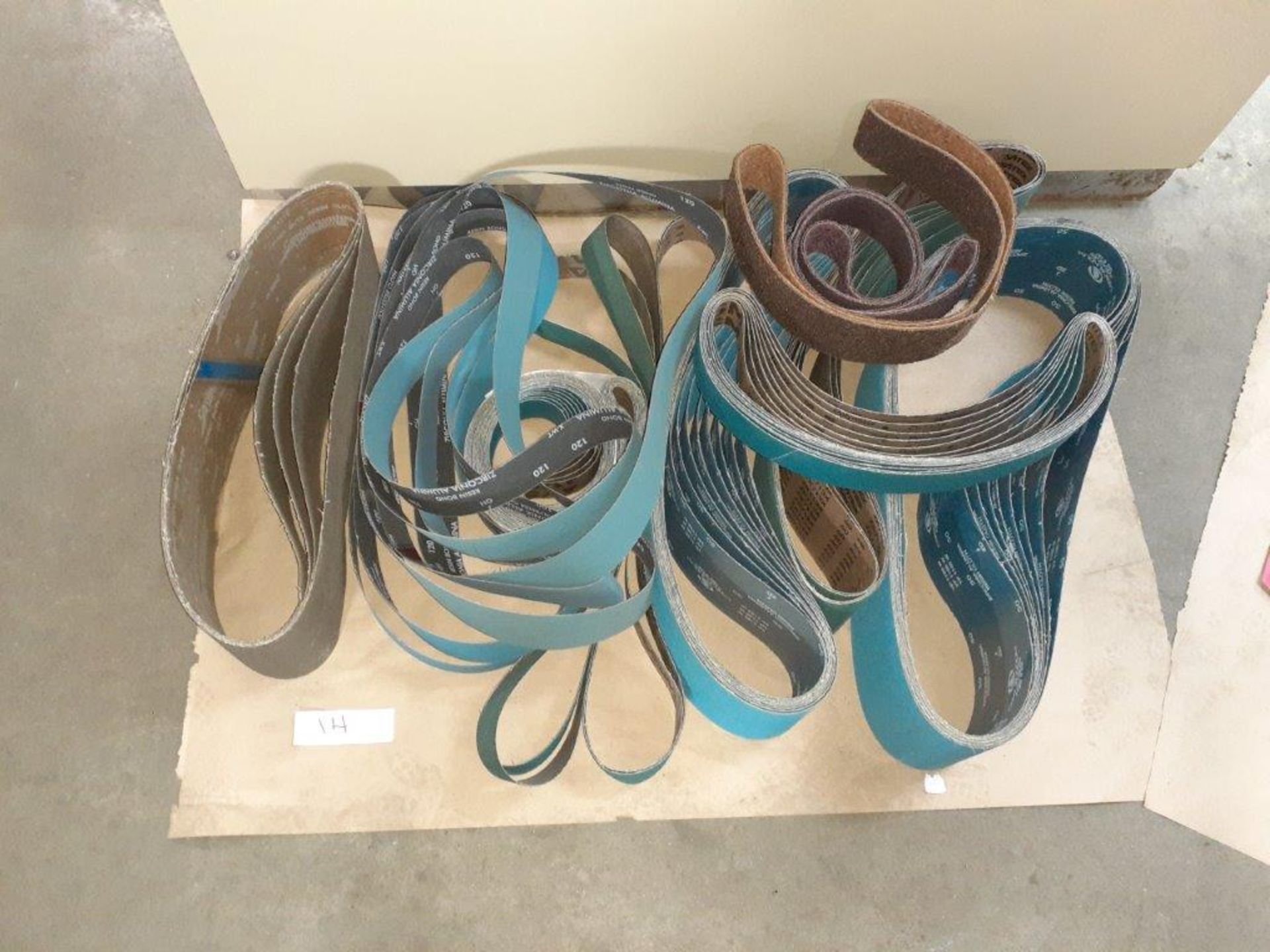 LOT: (54 pcs) Assorted Abbrasive Sanding Belts: (5) 6" x 60" - 60 grit - (14) 2" x 60" - 50 grit, (