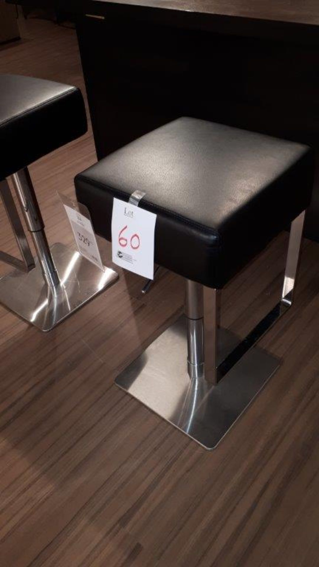 Ultra modern adjustable pivoting bar stool, black