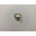 18ct bi-metal diamond solitaire, torsion, quarter carat diamond, makers mark D&B, total weight 6.8g