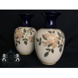 Pair of floral vases by Ladlett