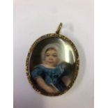 Early Victorian gold and gold plated mourning locket with hair behind glass beneath lid, inscribed