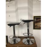 Pair of chrome and leather stools