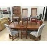 Large oak dining table and eight chairs