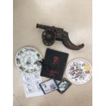 Book of war atrocities, metal cannon, plates and Militaria ephemera