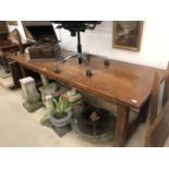 Large oak refectory dining table with two leaves.