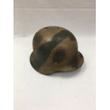 WWII M35 Tin Hat,Normandy camo decoration, stamped 642564 with eight fingered liner.