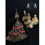 Quantity of perfume bottles and Indian coin set hanging