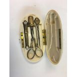 19th c French Ivory Etui, with gold Thimble, scissors, bodkin case etc.