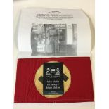 WWII Style German NSDAP arm band with printed explanation and picture.