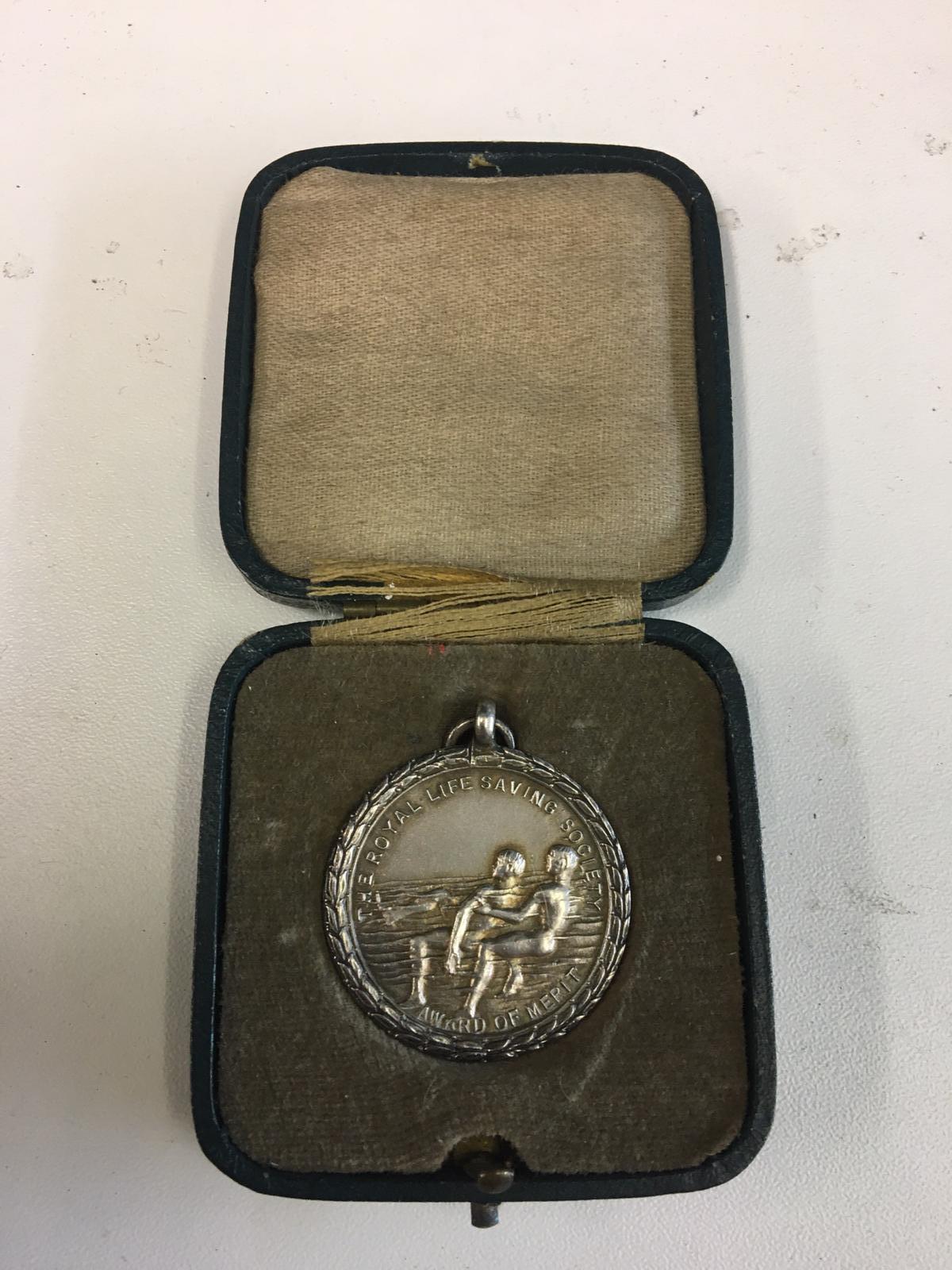 Cased HM Silver life saving medal.