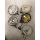Five vintage car lamps to inc Carello.