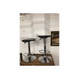 Pair of chrome and leather stools