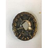 WWII Style Spanish Civil war Condor legion silver wound badge.