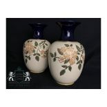 Pair of floral vases by Ladlett